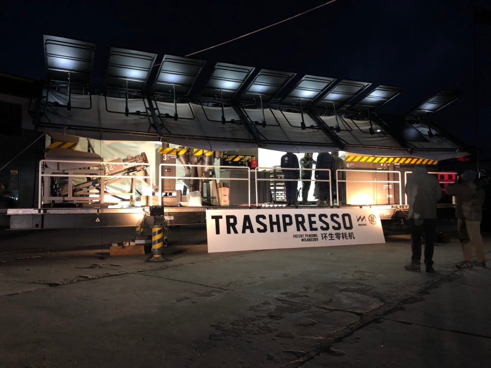 Trashpresso lit up at night, waiting for the tiles to cook. (photo credit: National Geographic/Sally Wu)